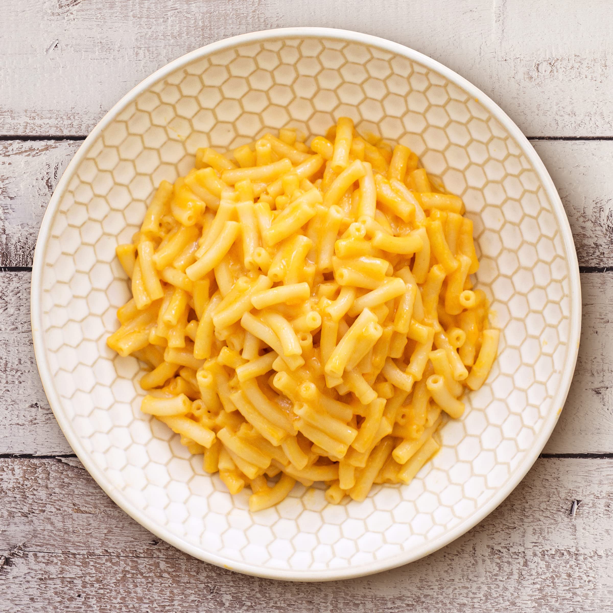 Annie's Vegan Mac and Cheddar sauce packet emphasizes dairy-free flavor