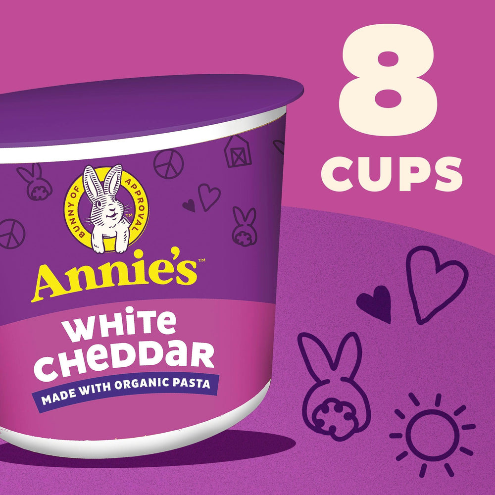 Close-up of creamy white cheddar cheese sauce in Annie's cup.