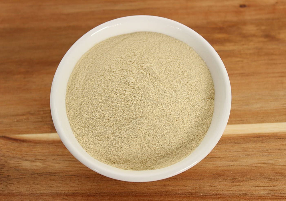Anthony's Brewers Yeast powder on cereal demonstrating seamless mix-in for daily nutrition.