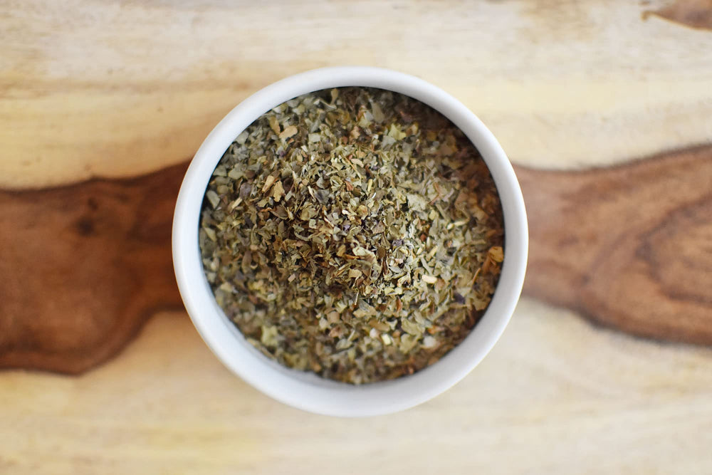 Anthony's Organic Dried Basil Leaves in a glass jar display.