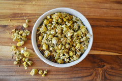Anthony's Organic Chamomile Flowers close-up, dried blossoms for soothing herbal infusions.