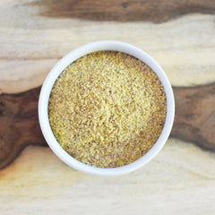 Anthony's flaxseed meal being stirred into smoothie for extra fiber.