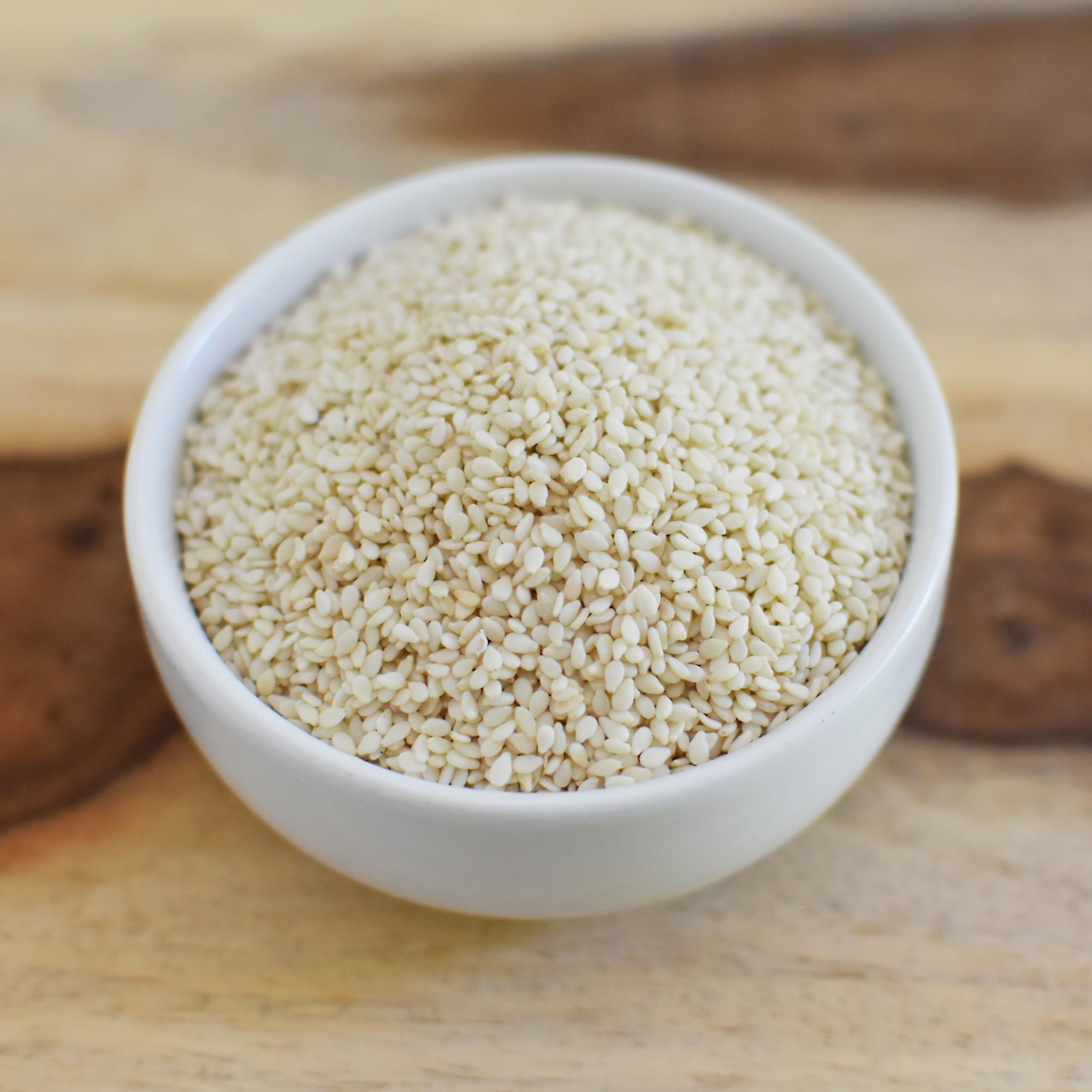Anthony's Organic Hulled Sesame Seeds kitchen scene shows versatile use in baking and granola