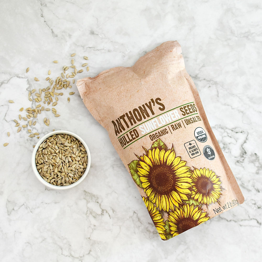 Anthony's Organic Hulled Sunflower Seeds snack straight from bag for quick energy.