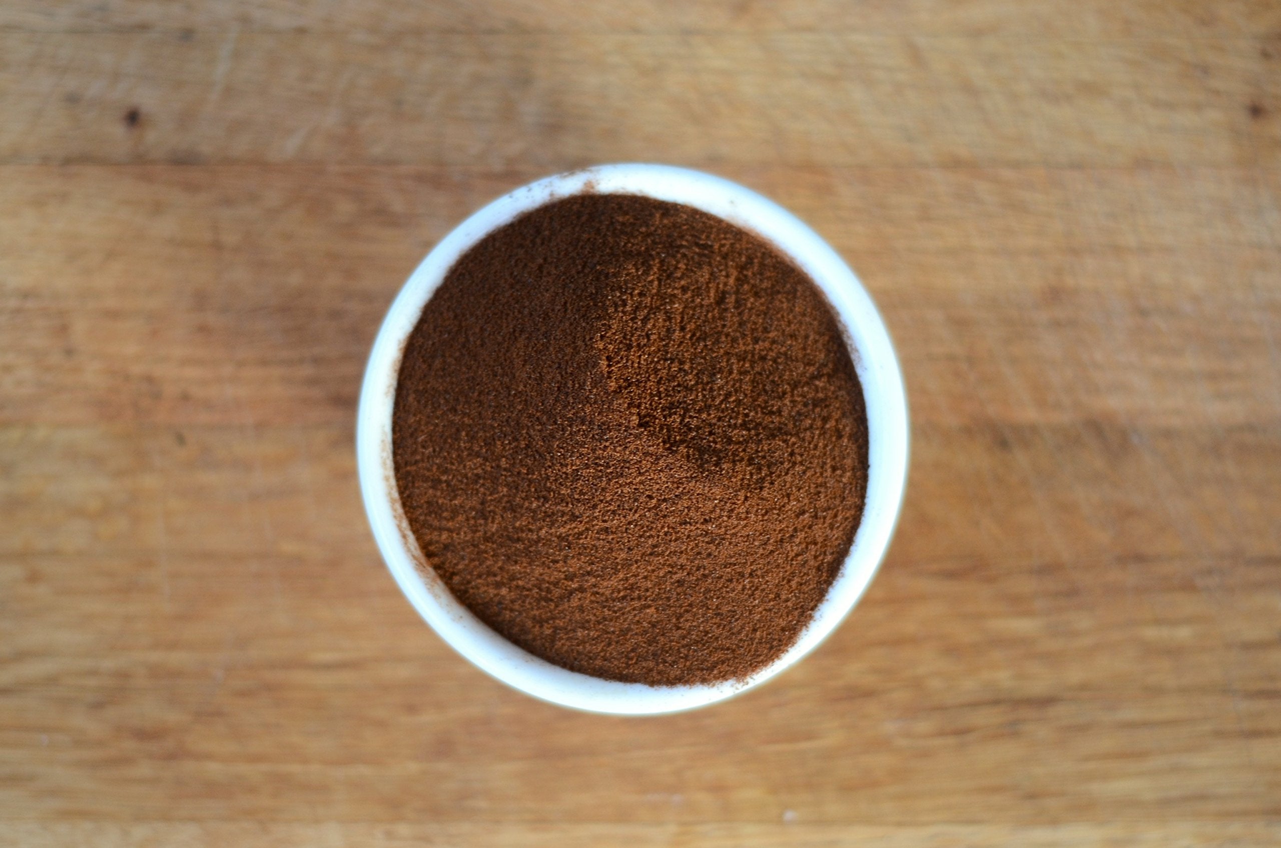 Anthony's Organic Instant Coffee aroma rises from hot water signaling Arabica quality.
