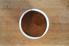 Anthony's Organic Instant Coffee aroma rises from hot water signaling Arabica quality.