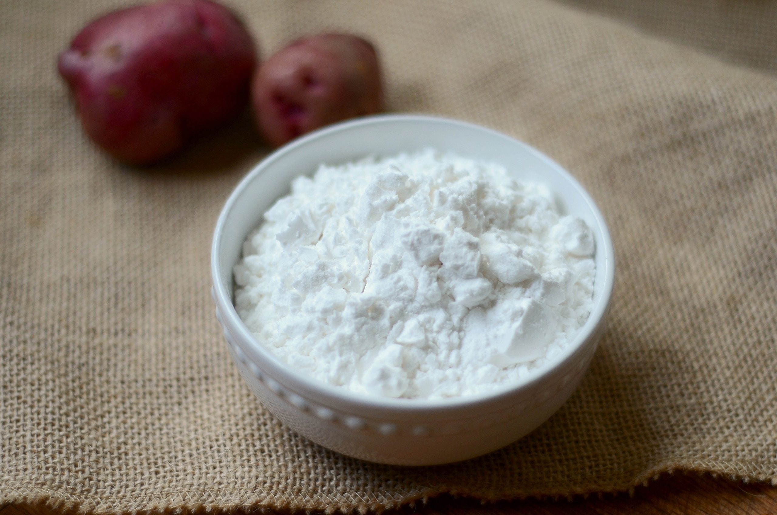 Anthony's Organic Potato Starch sauce thickening in a pan for savory dishes