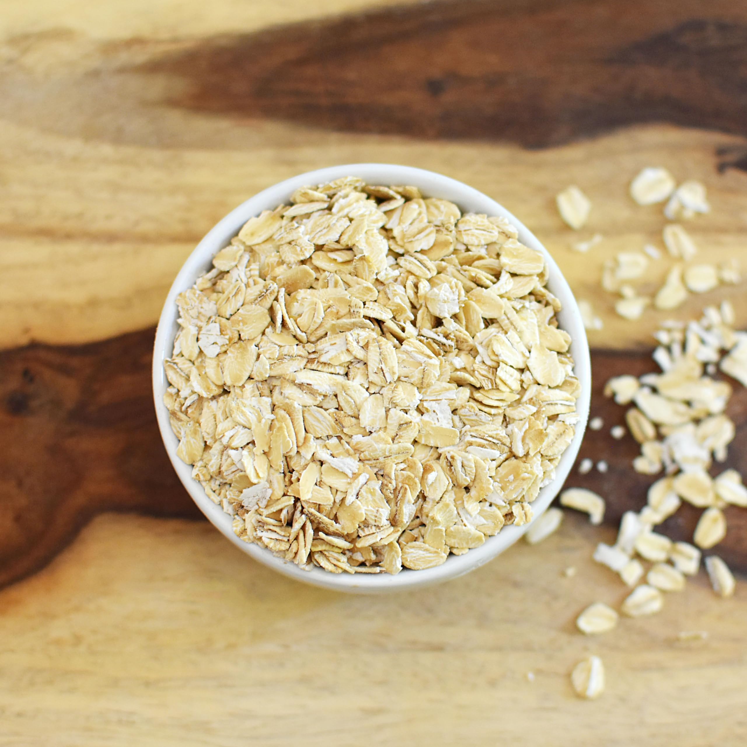 Close-up of Anthony's Organic Rolled Oats, showing whole grain texture for creamy porridge.