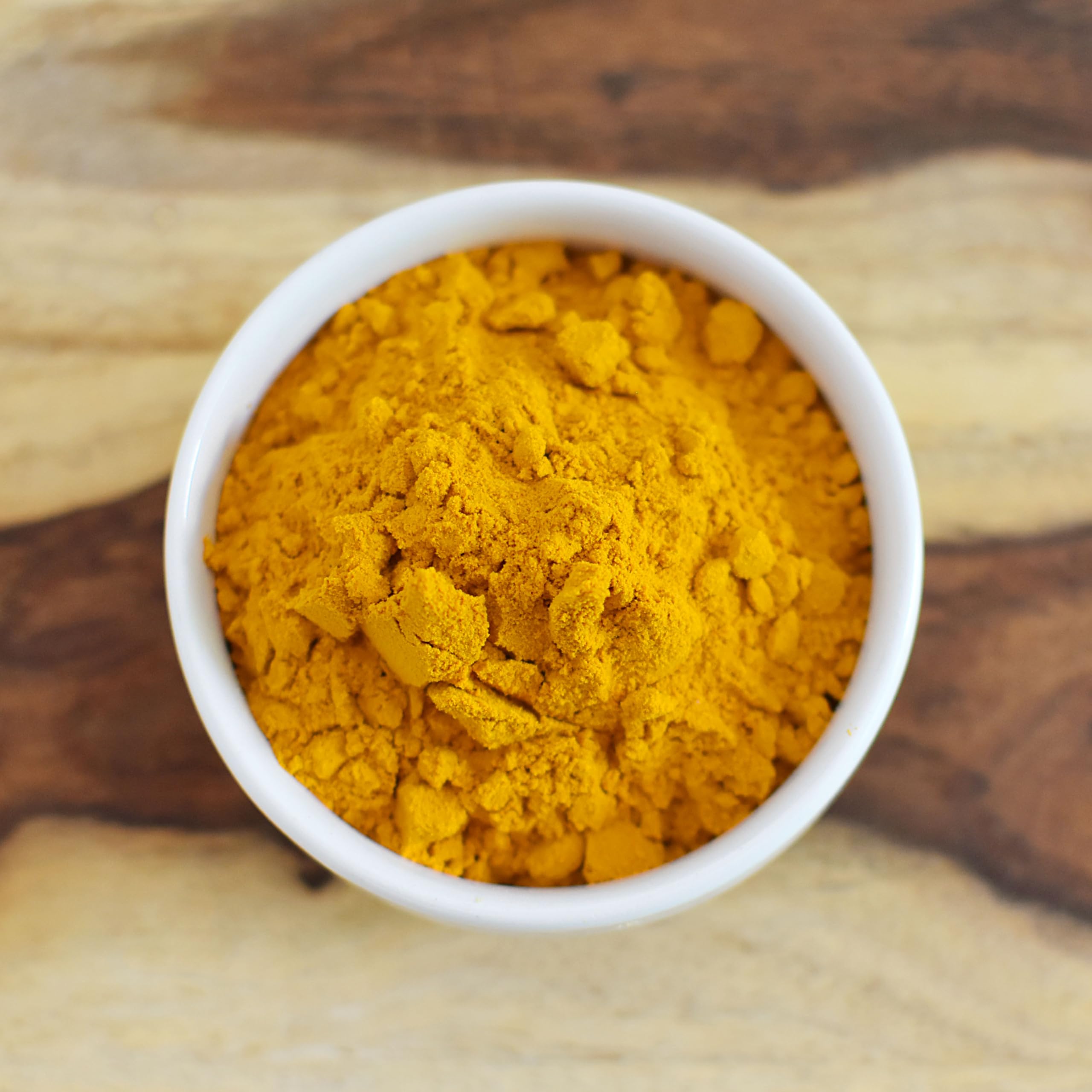 Versatile turmeric powder boosts smoothies, baking, and savory dishes.