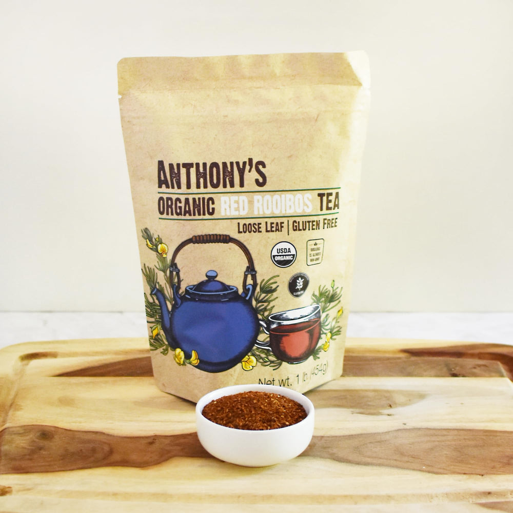 Anthony's Rooibos tea pouring into a mug — smooth, caffeine-free relief.