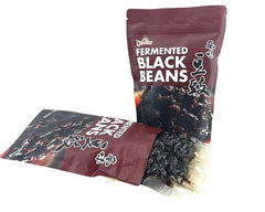 Apexy Douchi beans in a bowl showing rich texture and ready-to-use seasoning.