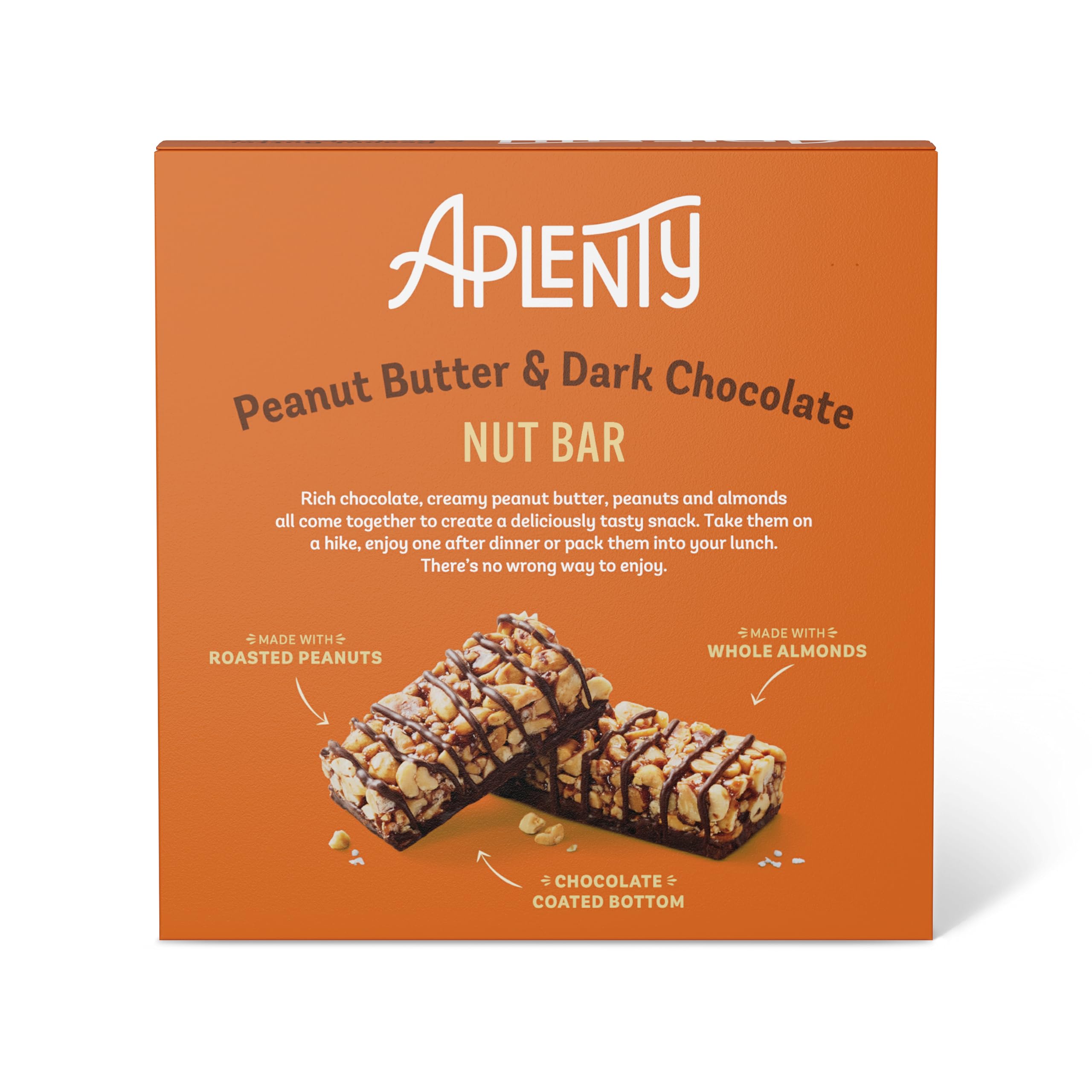 Aplenty dark chocolate peanut butter bar held in hand for a quick grab-and-go snack.