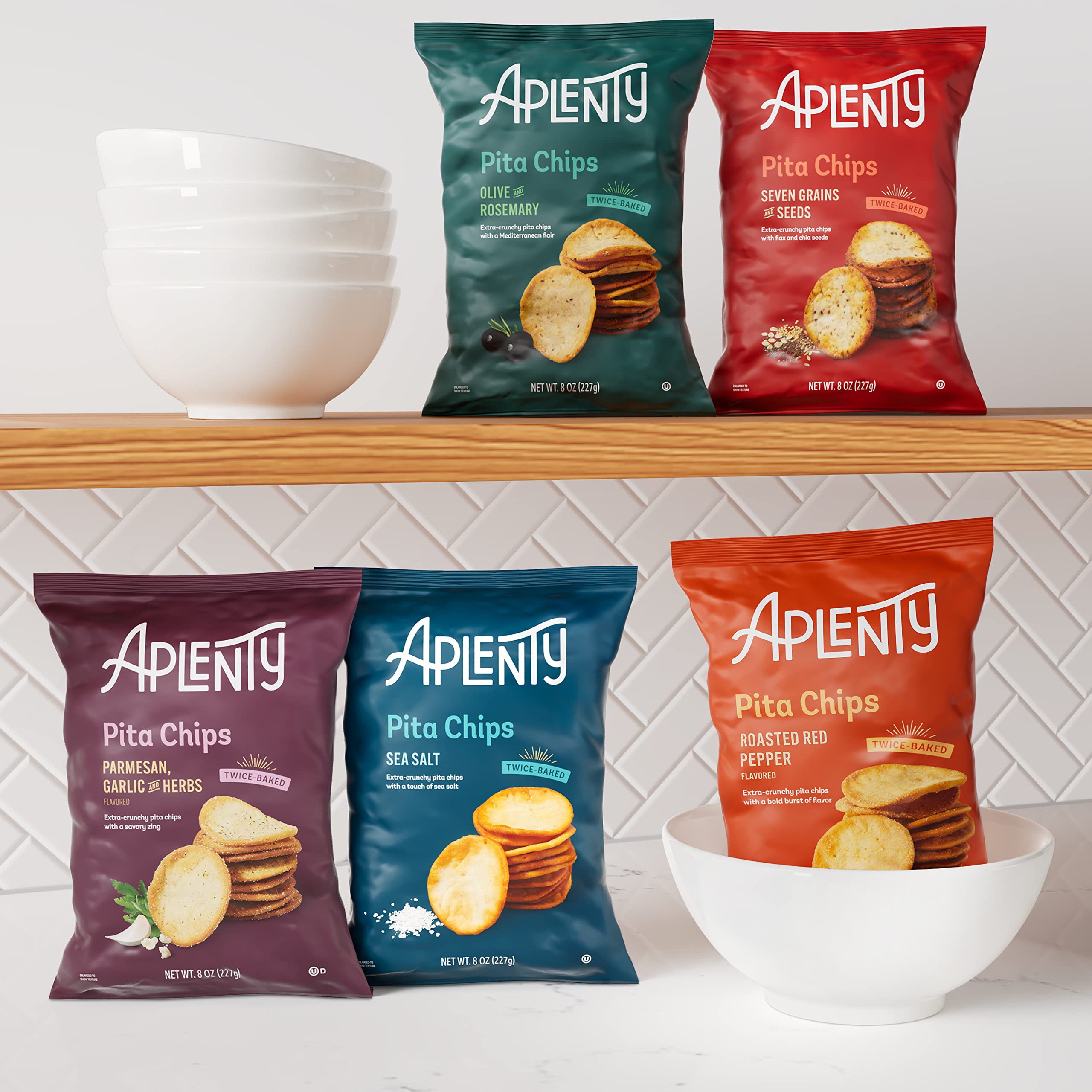 Aplenty pita chips with kosher-certified label visible, signaling quality.