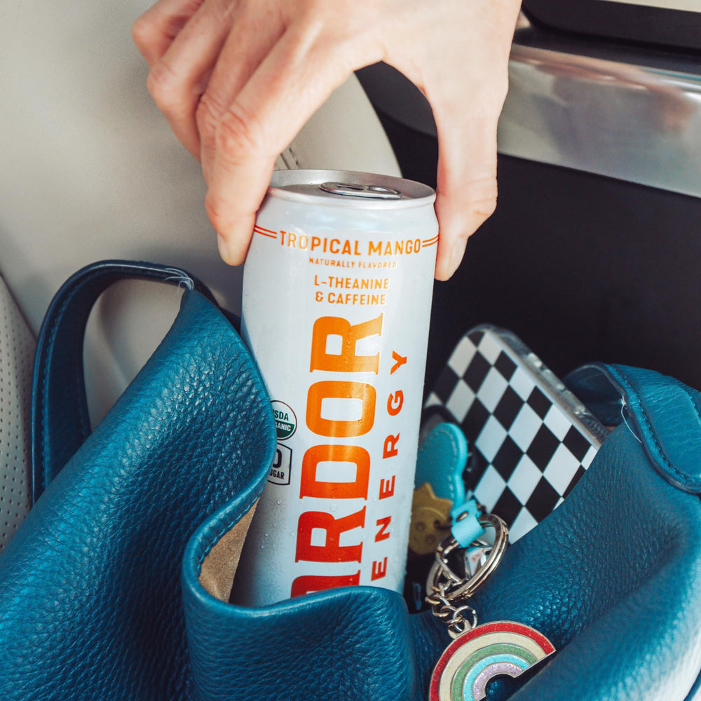 ARDOR Energy 12oz can in a gym bag ready for workouts.