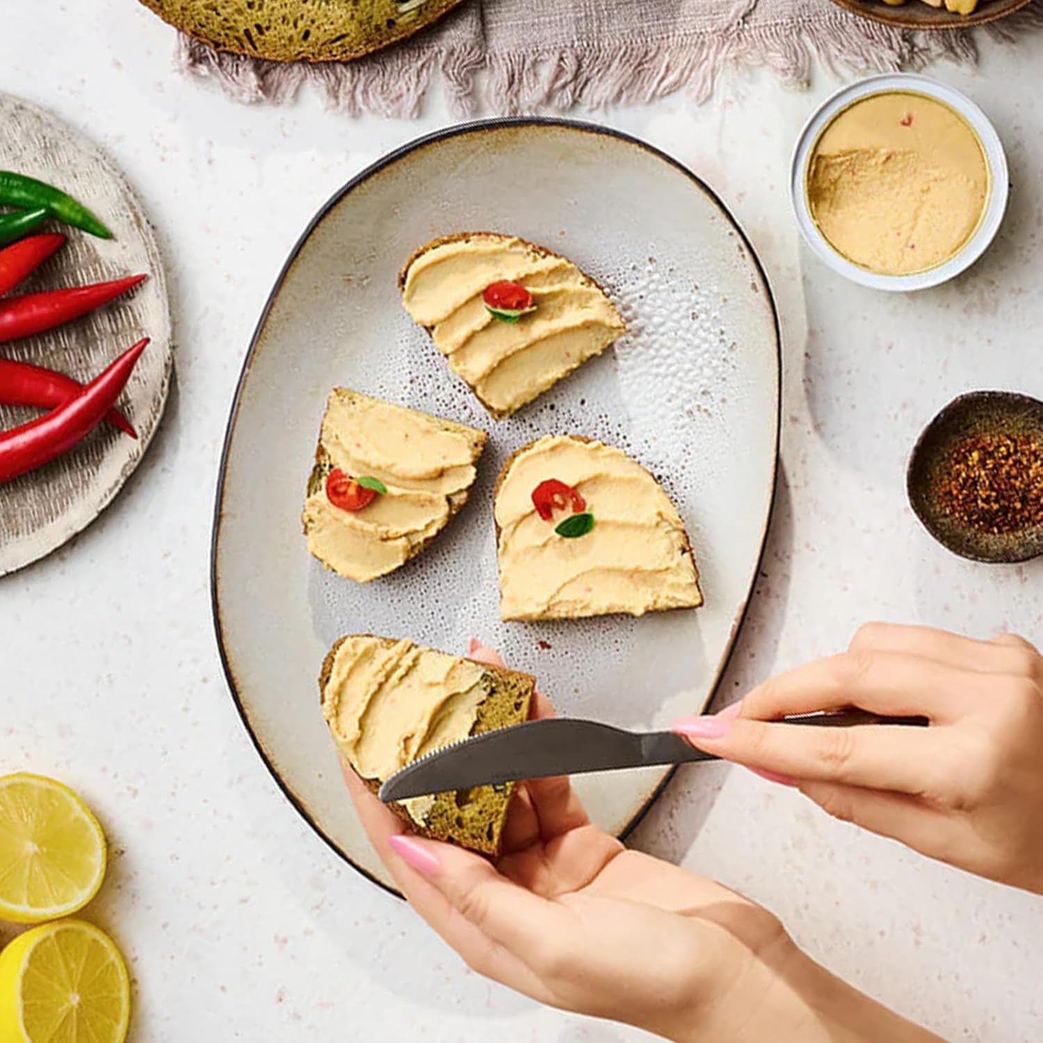 Argeta chicken pâté spread as a dip with crackers for dipping.