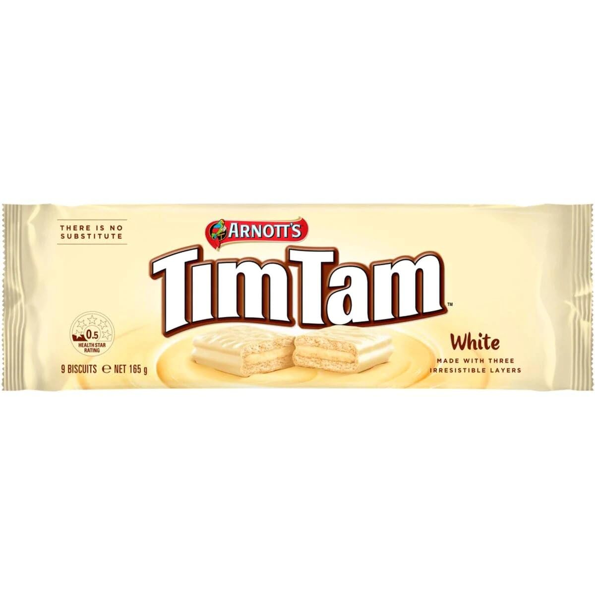 Tim Tam White bite shows dunk-friendly texture for tea or coffee.