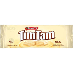 Tim Tam White bite shows dunk-friendly texture for tea or coffee.