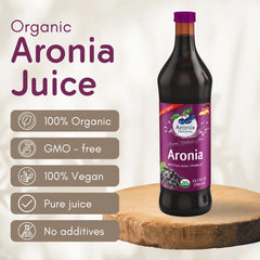 Aronia Original bottle pour into glass for a refreshing, berry-forward pour.