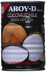 Aroy-D coconut milk being poured for curries and desserts