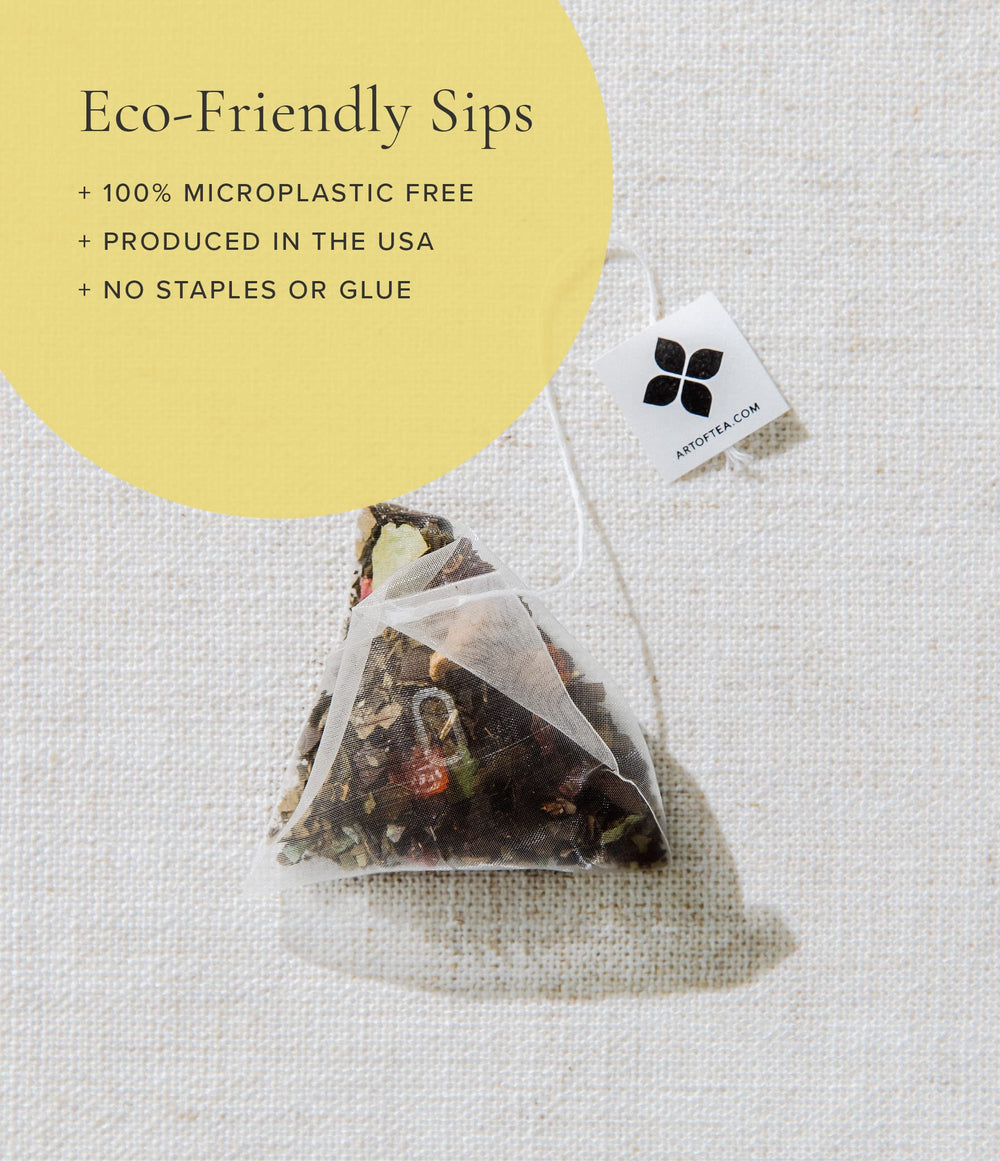 Hot cup of Art of Tea Organic Happy Tea with inviting aroma