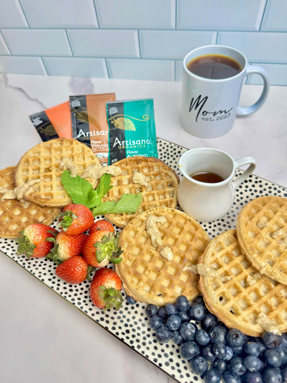 Artisana Organics almond butter snack pack flat lay, ready to eat.
