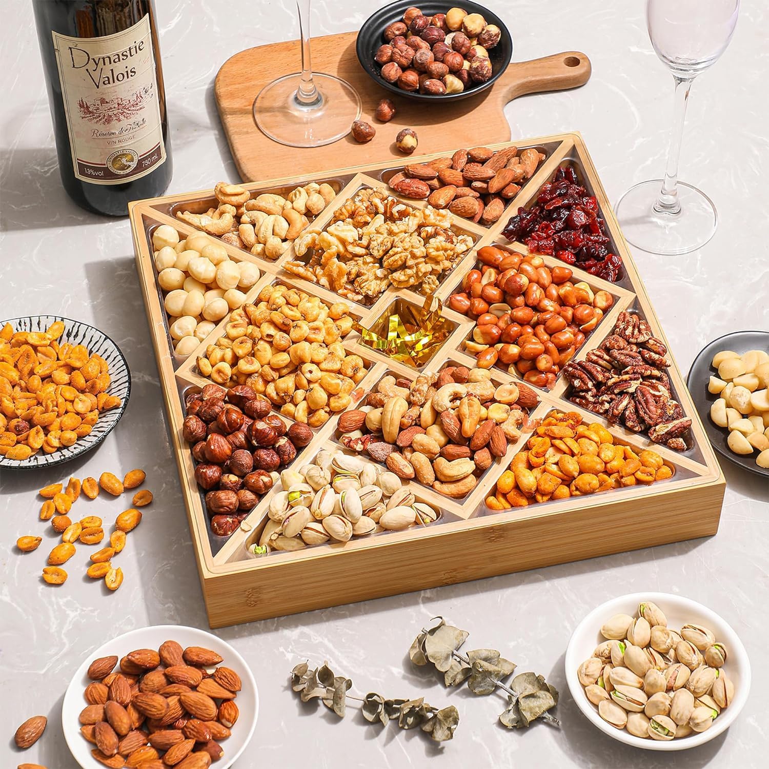 Artisanal Cravings bamboo platter shot with mixed nuts.