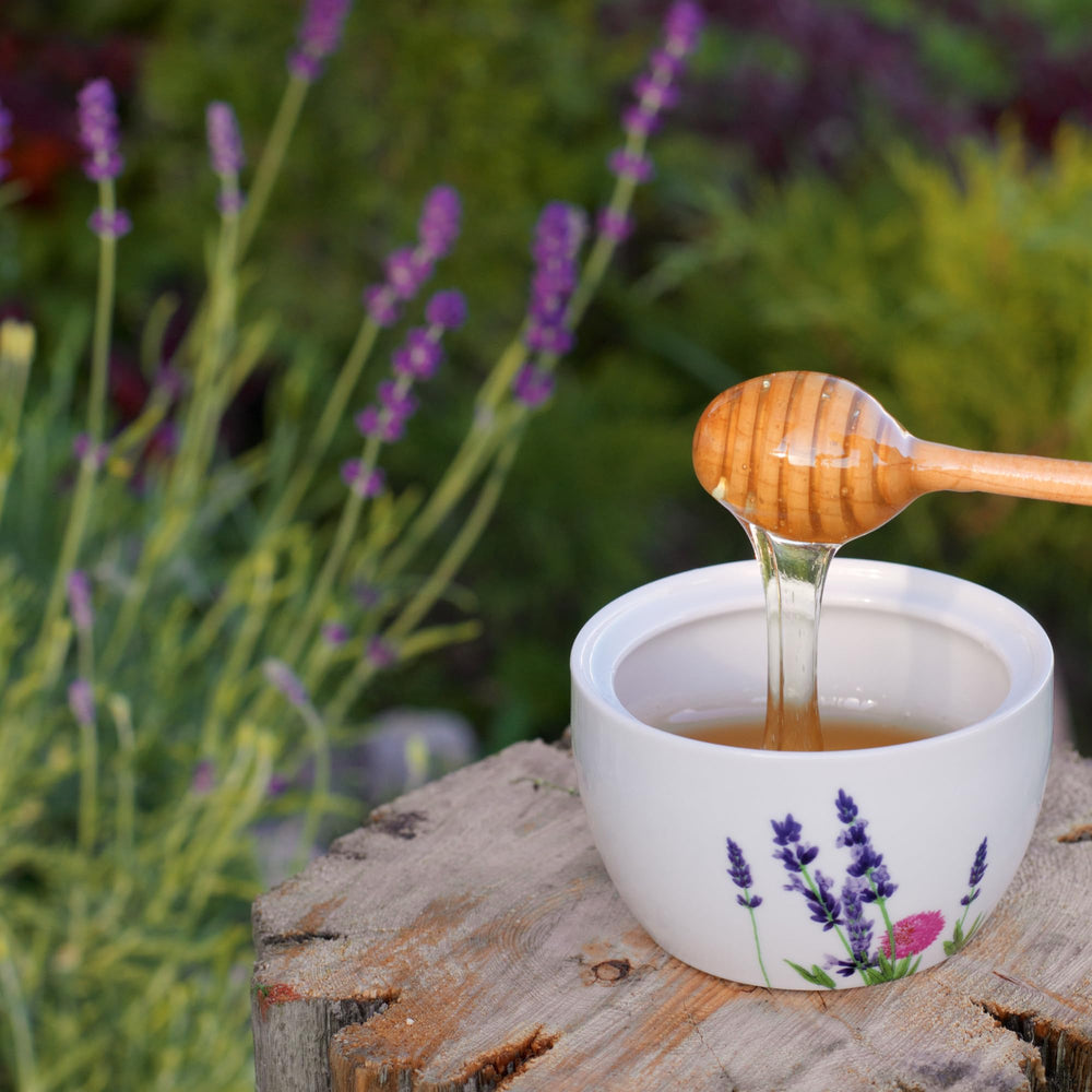 Arvoli raw wildflower honey jar showing natural color and purity.
