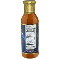 Pouring Asian Fusion Sweet & Sour Sauce over vegetables for quick stir-fry.