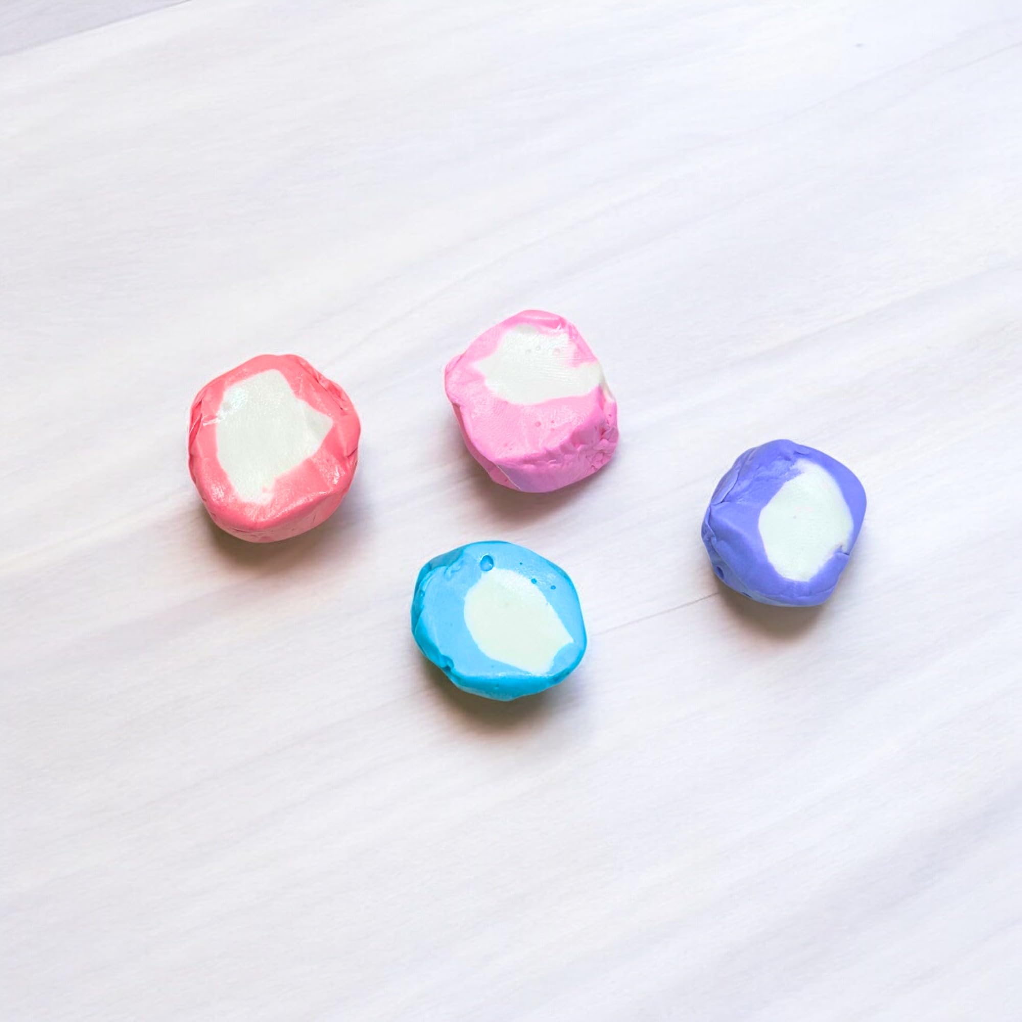 Assortit Berries and Creme Taffy individually wrapped pieces, ideal for crowd-friendly treats.