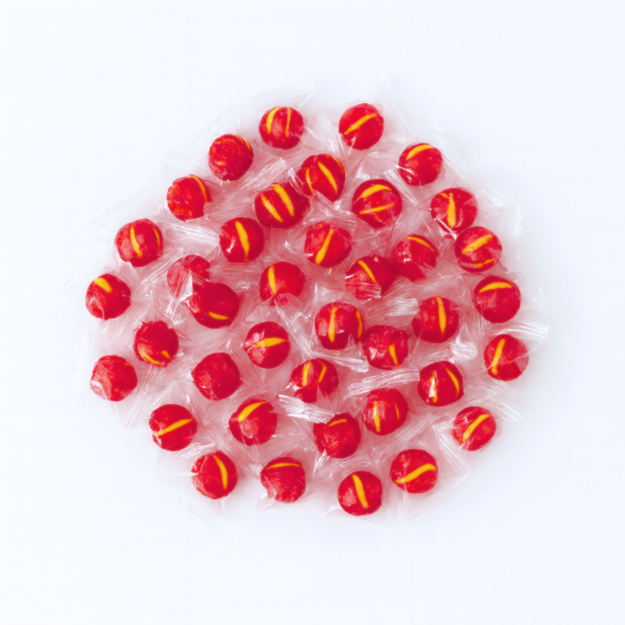 Assortit Cherry Balls on an office desk as a quick snack boost.