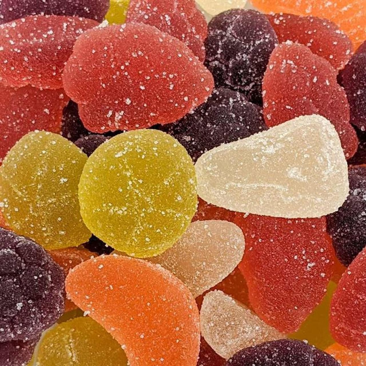 Assortit jelly fruit candy colorful slices in bulk bag, perfect for parties