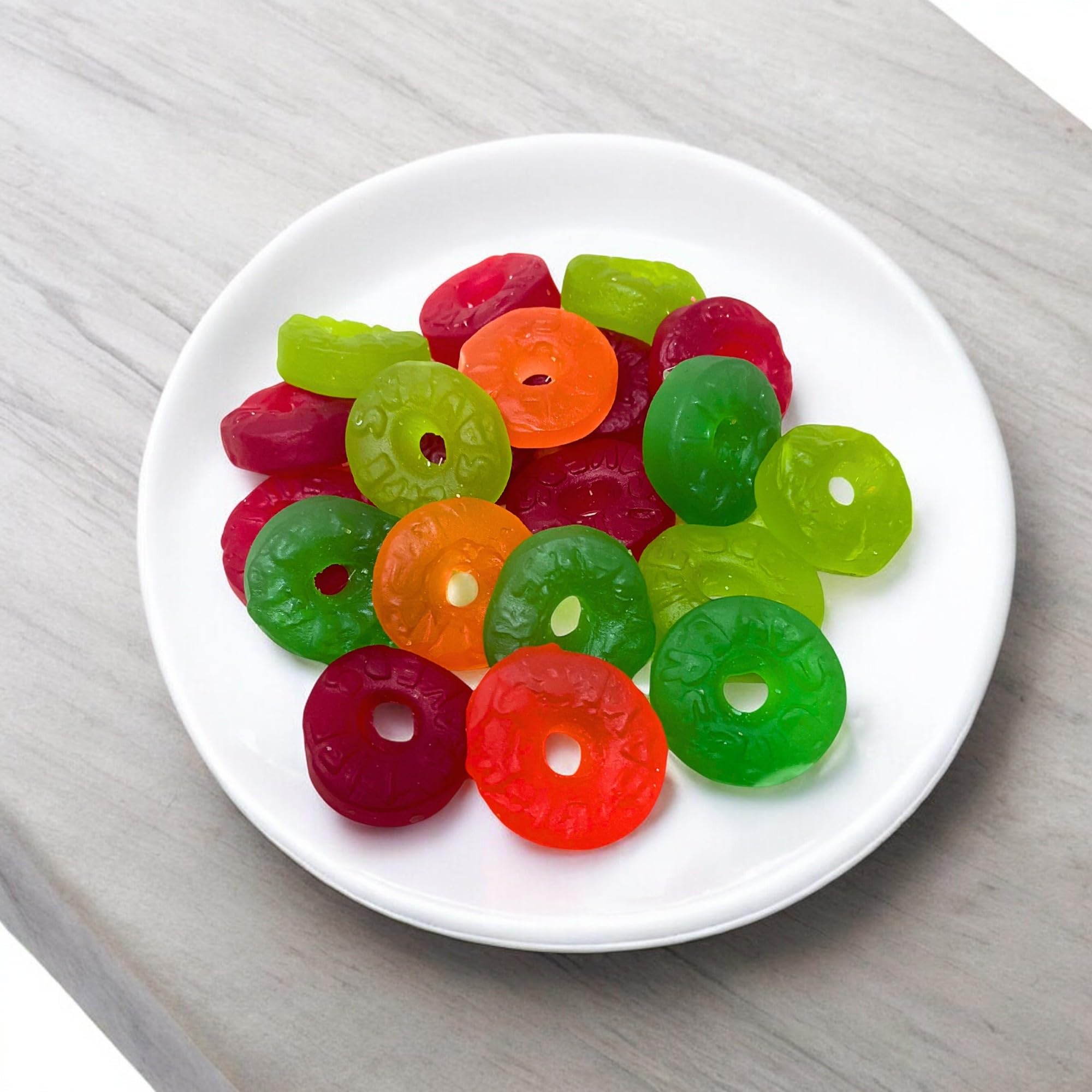 Assortit Life Savers collab fun-size packs used as party favors and candy bowls.