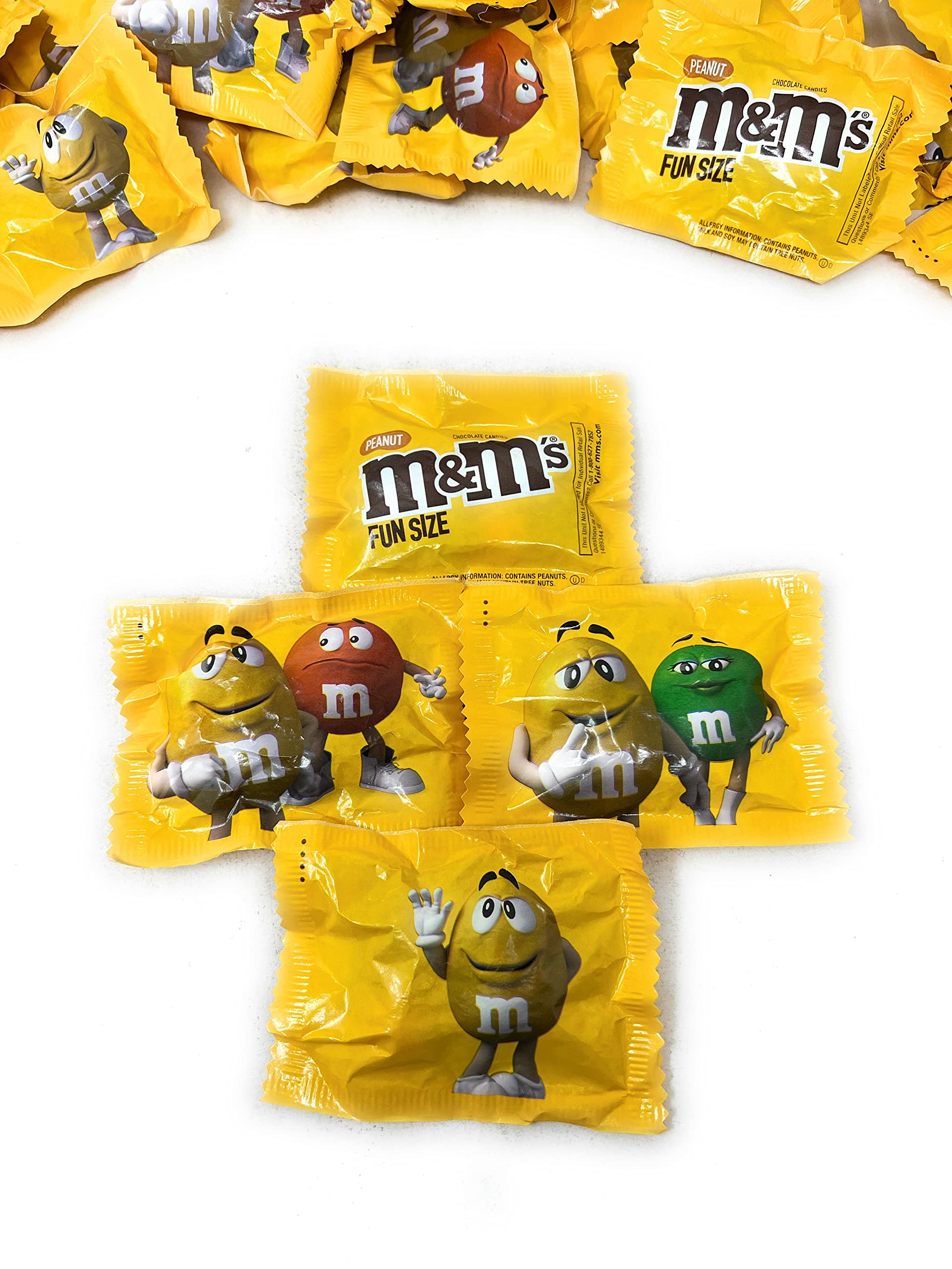 Assortit M&M colorful candy shell close-up indicates snack-ready portions.