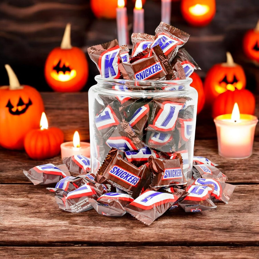 Assortit Snickers Minis office desk snack for quick boosting.