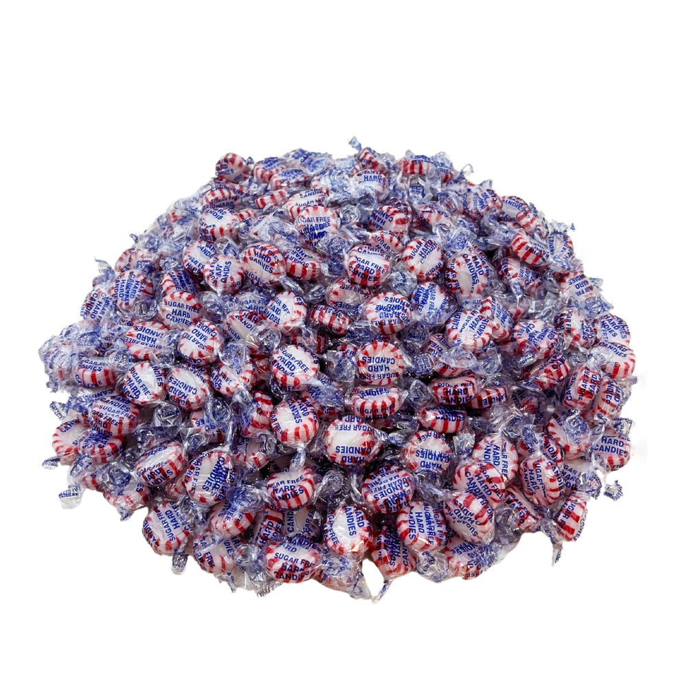 Assortit sugar free peppermint starlight mints on office desk snack tray.