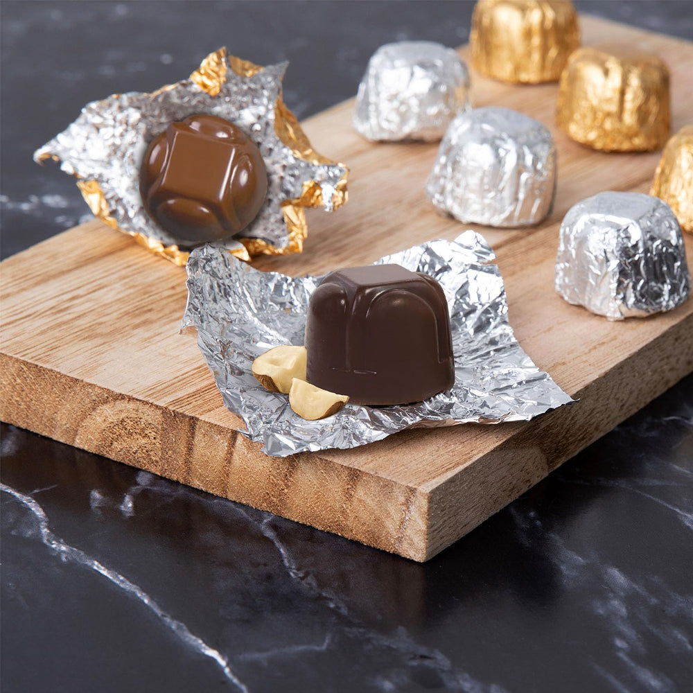 ASTOR truffles in setup box illustrate elegant gifting and easy storage.