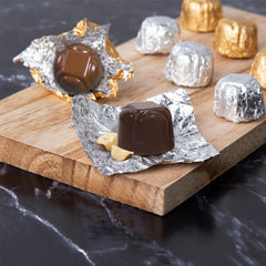 ASTOR truffles in setup box illustrate elegant gifting and easy storage.
