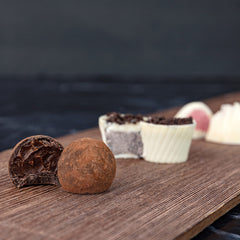 ASTOR Dark Caramel Sea Salt truffle with silky center.