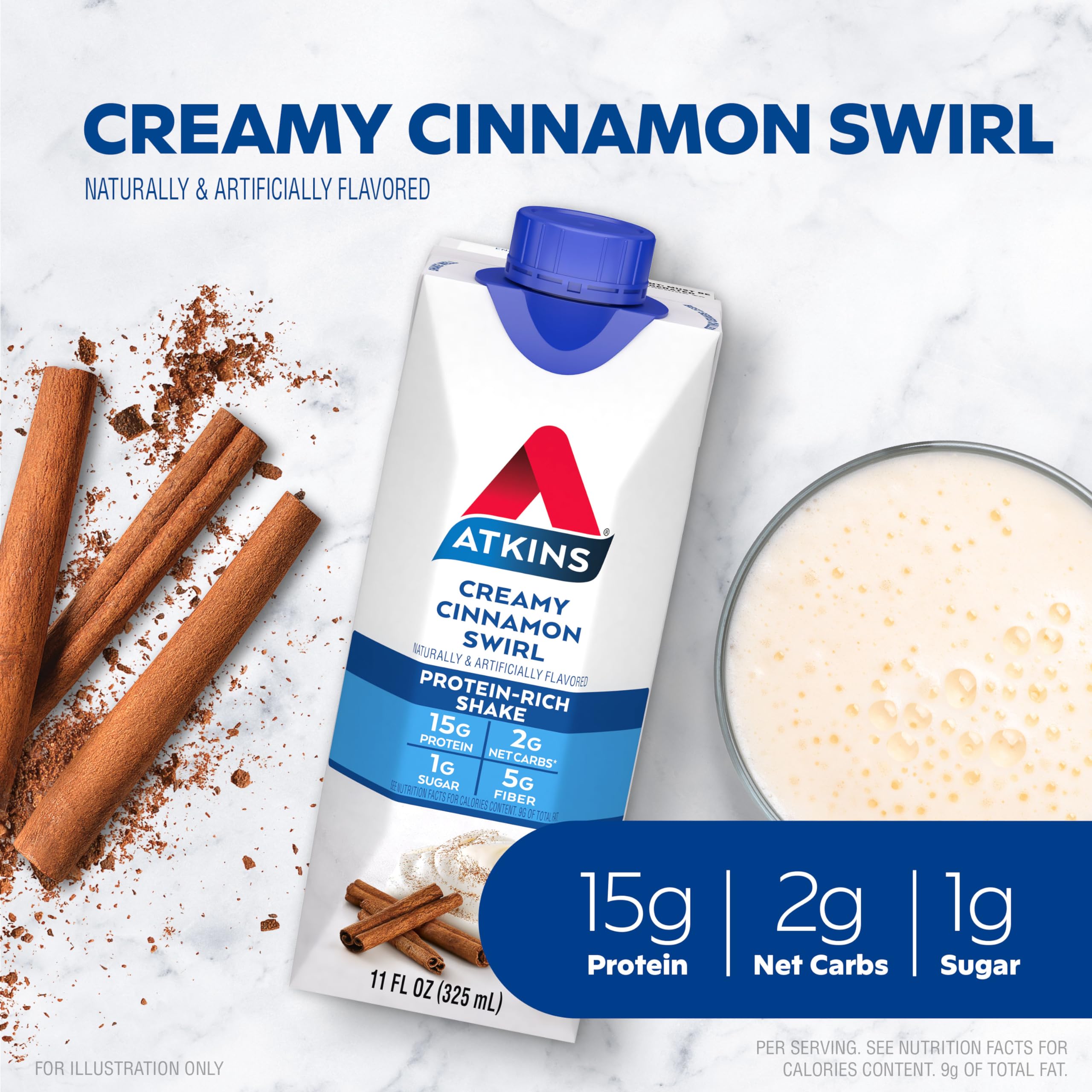 A glass of Atkins Creamy Cinnamon Swirl shake beside a cup of coffee