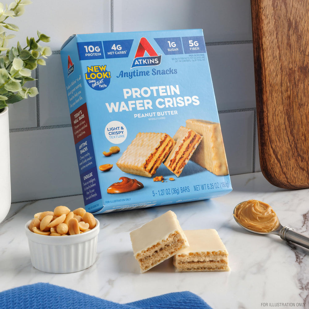 Atkins Peanut Butter Protein Wafer Crisps paired with yogurt for a protein snack.