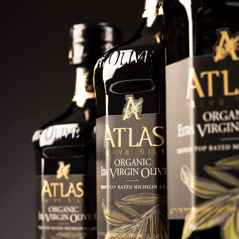 Atlas Olive Oils packaging includes eco friendly glass bottle and gift-ready presentation.