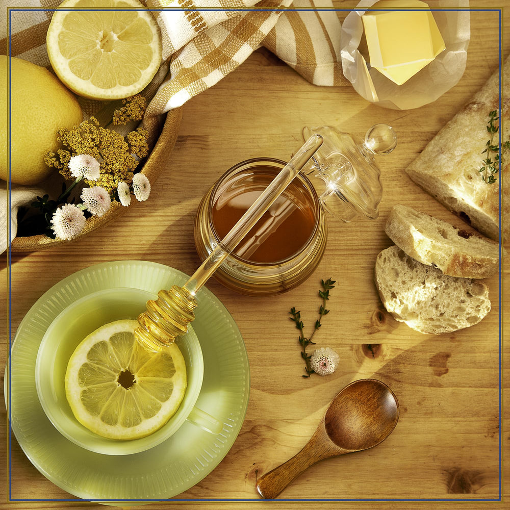 Spoon of Attiki Honey over yogurt; embodies velvety texture and herbal aroma