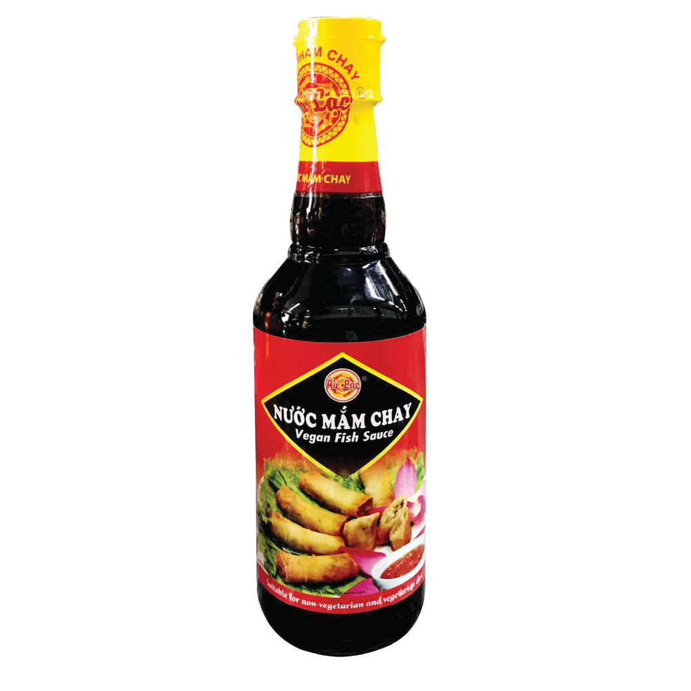 Au Lac vegan fish sauce bottle pour enhances savory meals with easy umami enhancement.