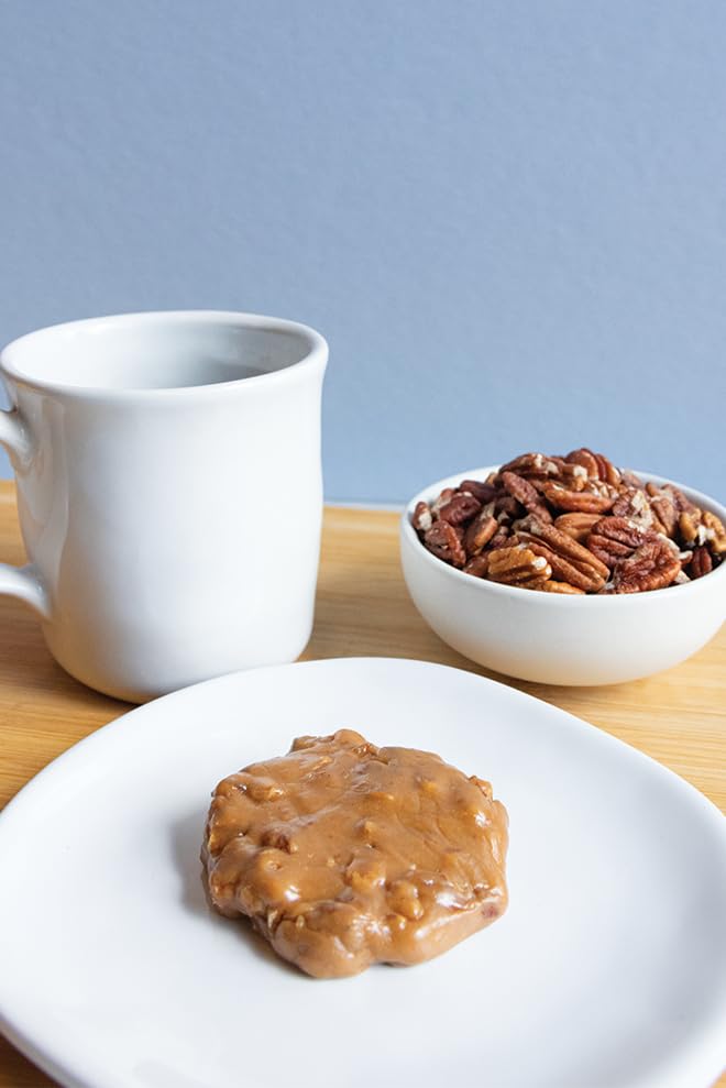 Gift-ready pralines in a 16-count box, perfect for celebrations and hostess gifts.
