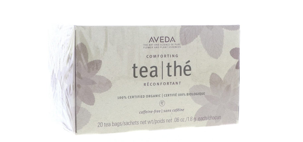 Aveda Comforting Tea Bags licorice-peppermint blend foreground highlights natural flavors.