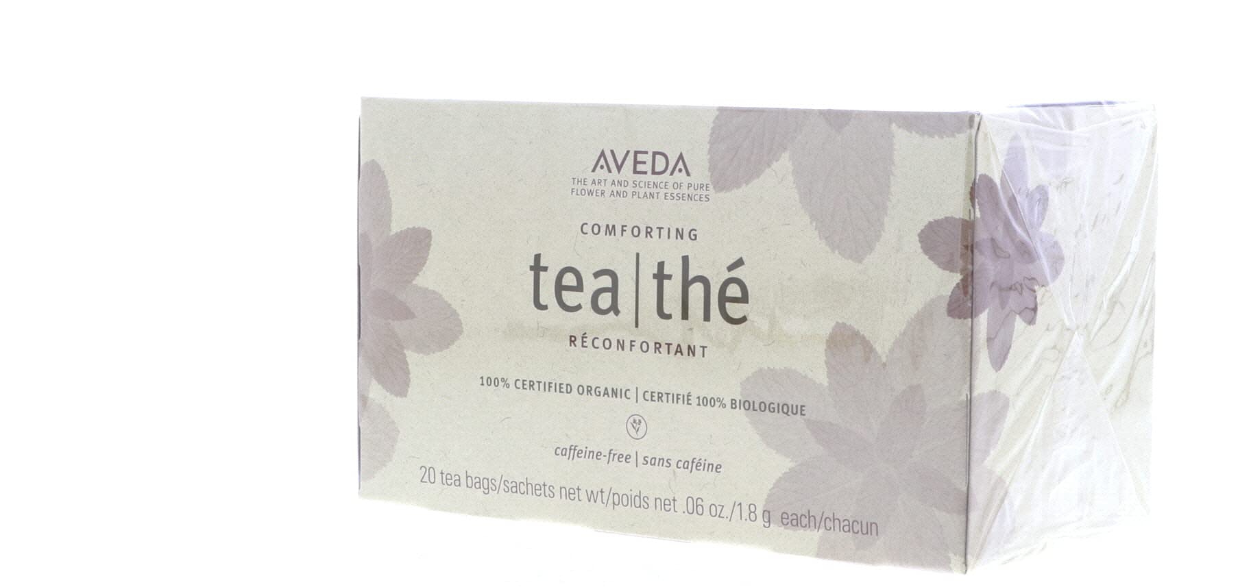 Aveda Comforting Tea Bags tea bag in cup captures soothing peppermint and licorice aroma.