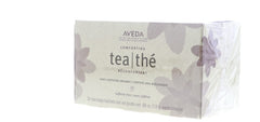 Aveda Comforting Tea Bags tea bag in cup captures soothing peppermint and licorice aroma.