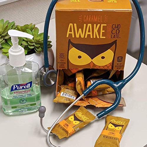 AWAKE Caffeinated Chocolate Bites bite in hand ideal study snack.