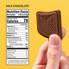 Open wrapper of AWAKE Milk Chocolate Bites showing individual portions for on-the-go snacking.