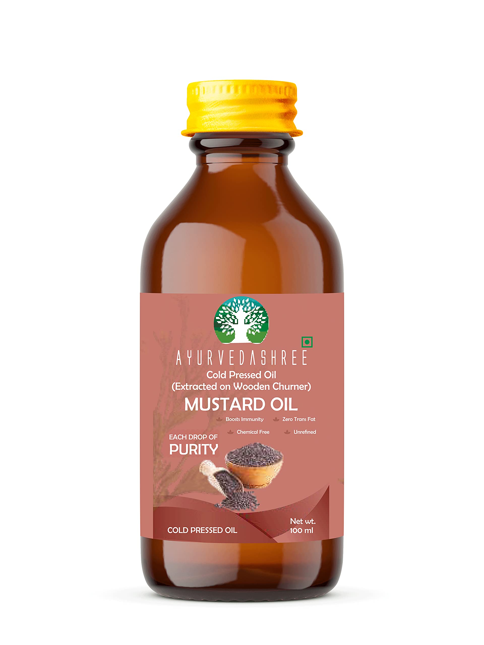 AYURVEDASHREE mustard oil poured from wooden churner, traditional extraction preserves nutrients.